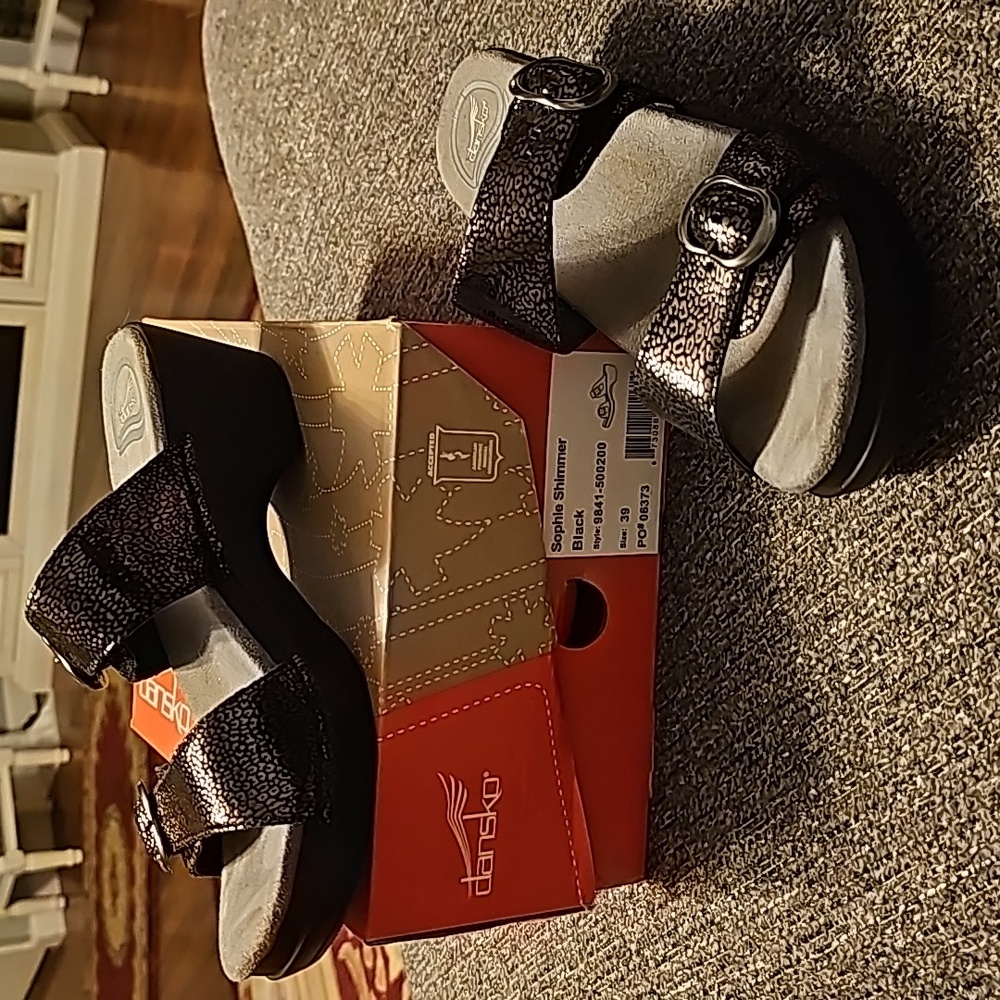 Dansko black shimmer size 8 sandals.